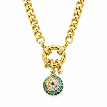 A gold-toned chunky chain necklace with a ring clasp and a dangling evil eye charm. The charm features a gold border, turquoise blue stones, and a central dark blue stone surrounded by small clear stones, set against a plain white background.