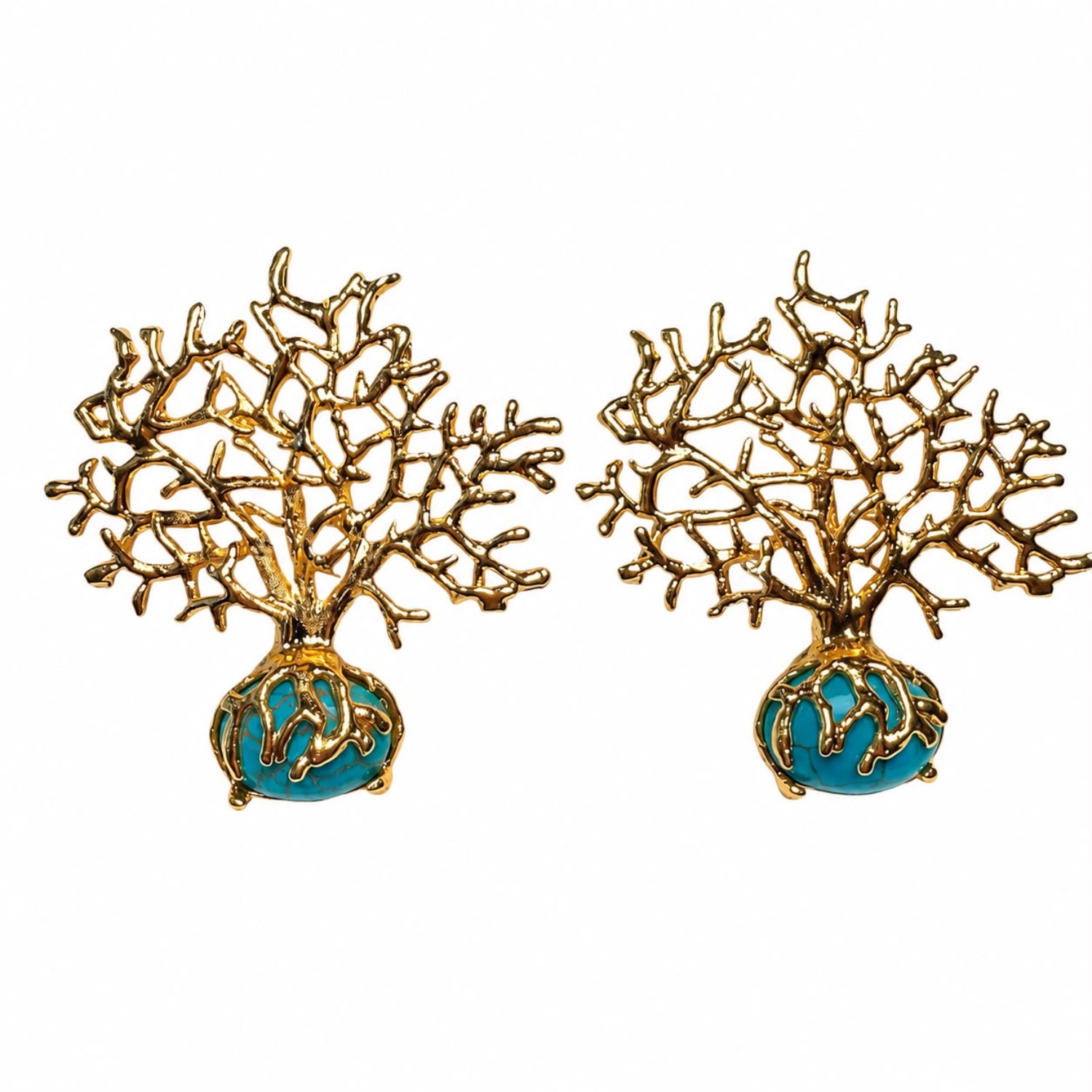 A pair of coral tree stud earrings with gold-toned branches and a turquoise blue oval base, shown on a plain white background.